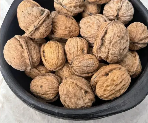 Nueces con cáscara orgánico